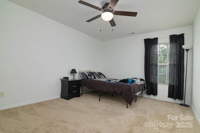 8511 Redding Glen Ave, Charlotte, NC 28216 - carpeted bedroom featuring baseboards and ceiling fan