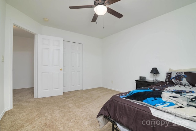 8511 Redding Glen Ave, Charlotte, NC 28216 - carpeted bedroom with a closet, ceiling fan, and baseboards