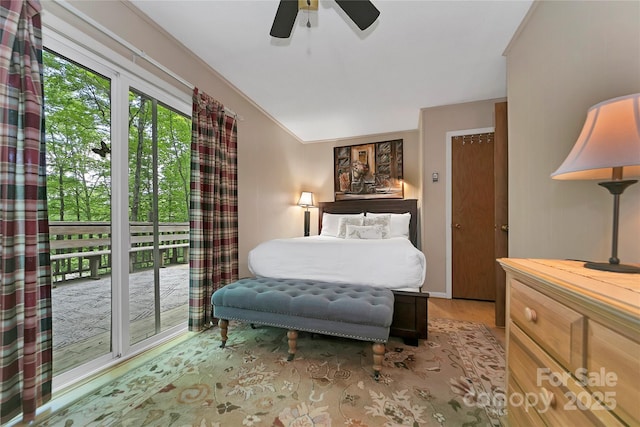 bedroom with light wood-type flooring and a ceiling fan