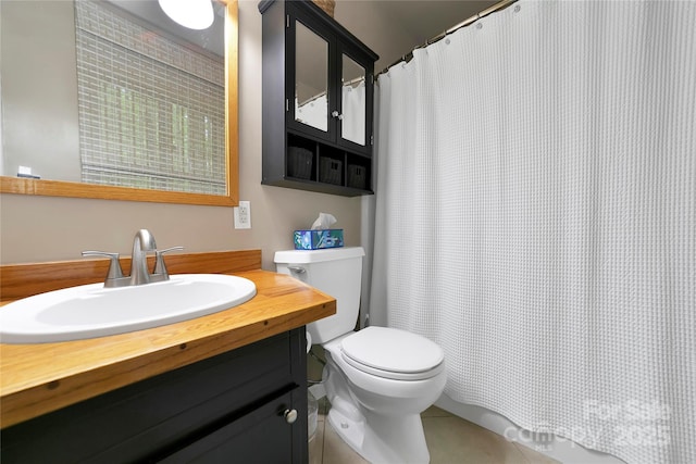 bathroom with toilet, vanity, and a shower with curtain