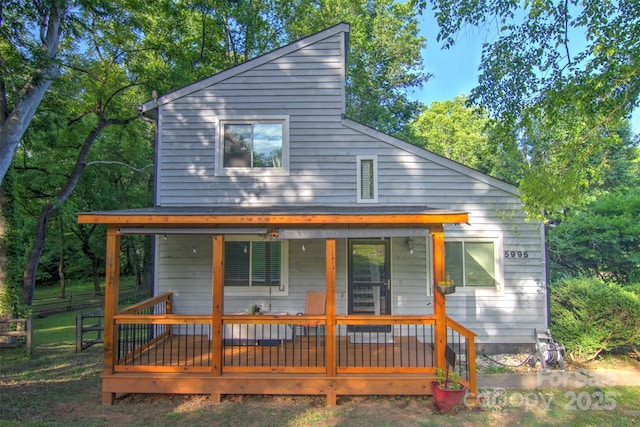 5995 Tall Tree Ln, Harrisburg, NC 28075 - view of front of home with covered porch and fence