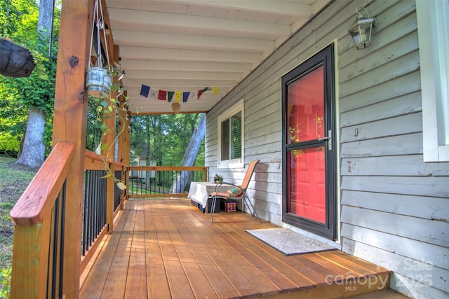 5995 Tall Tree Ln, Harrisburg, NC 28075 - deck with a porch