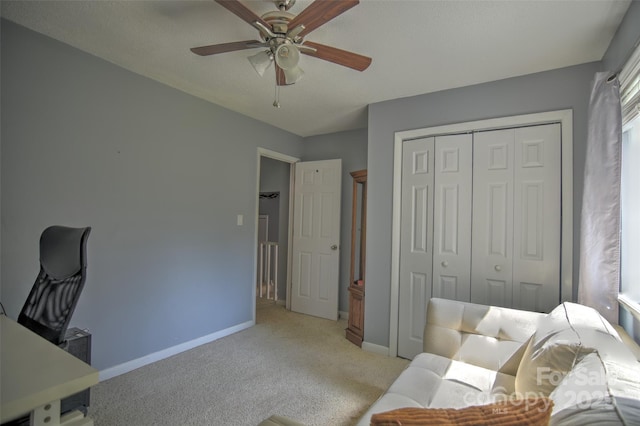 5995 Tall Tree Ln, Harrisburg, NC 28075 - home office featuring light colored carpet, a ceiling fan, and baseboards