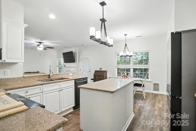 2426 Tory Oak Pl, Matthews, NC 28105 - kitchen featuring appliances with stainless steel finishes, white cabinetry, ceiling fan, dark wood-style floors, and tasteful backsplash