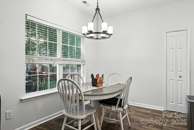 2426 Tory Oak Pl, Matthews, NC 28105 - dining room with a chandelier and wood finished floors