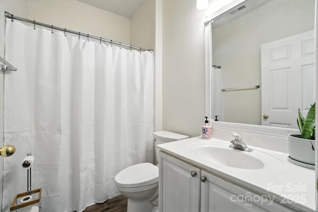2426 Tory Oak Pl, Matthews, NC 28105 - full bathroom featuring vanity, wood finished floors, and curtained shower