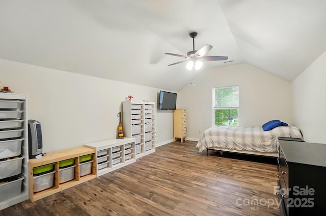 2426 Tory Oak Pl, Matthews, NC 28105 - bedroom with wood finished floors, vaulted ceiling, and a ceiling fan