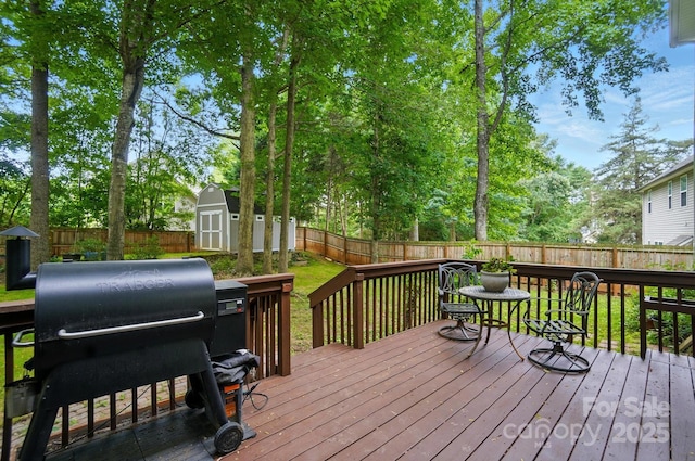 2426 Tory Oak Pl, Matthews, NC 28105 - deck featuring a grill, a fenced backyard, and a storage shed