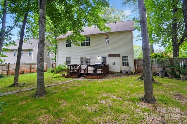 2426 Tory Oak Pl, Matthews, NC 28105 - rear view of house with a deck and a fenced backyard