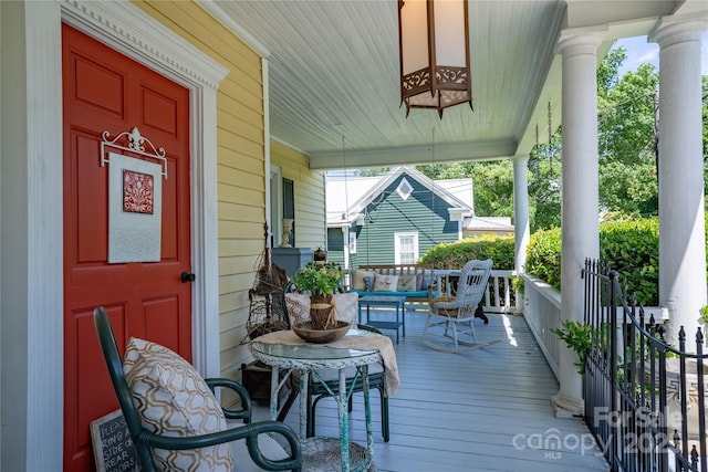 131 E Lexington Rd, Mocksville, NC 27028 - wooden porch with outdoor lounge area