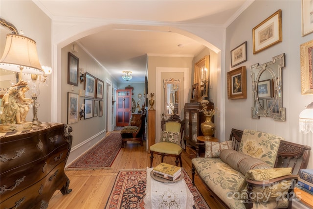 131 E Lexington Rd, Mocksville, NC 27028 - living area with arched walkways, light wood-style flooring, and ornamental molding