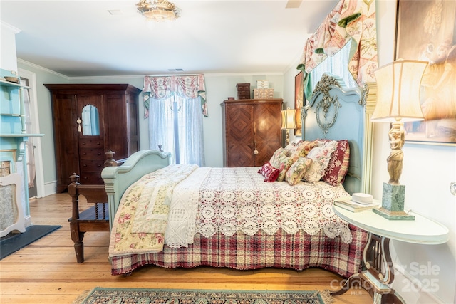 131 E Lexington Rd, Mocksville, NC 27028 - bedroom featuring wood-type flooring and crown molding