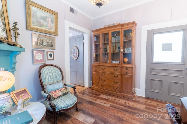 131 E Lexington Rd, Mocksville, NC 27028 - sitting room with wood finished floors and ornamental molding