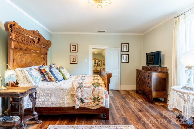 131 E Lexington Rd, Mocksville, NC 27028 - bedroom featuring wood finished floors, crown molding, and baseboards