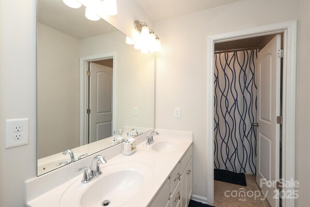 1914 Loggerhead Dr, Lancaster, SC 29720 - bathroom with double vanity and tile patterned floors
