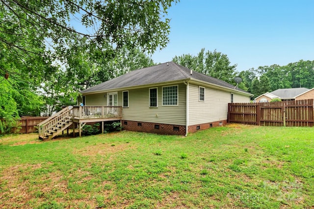 rear view of house with crawl space, a deck, stairs, and a shingled roof
