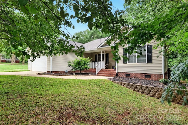 ranch-style house featuring a porch, a front yard, concrete driveway, an attached garage, and crawl space