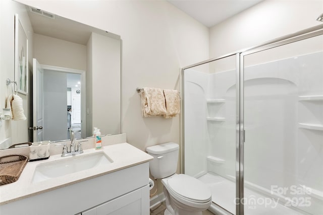 11518 Solstice Way, Huntersville, NC 28078 - bathroom with a stall shower, toilet, and vanity