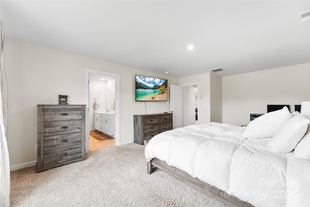 11518 Solstice Way, Huntersville, NC 28078 - bedroom with light carpet, baseboards, recessed lighting, and connected bathroom