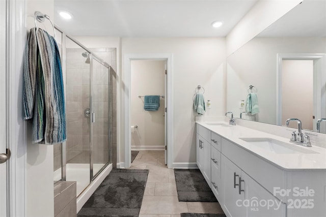 11518 Solstice Way, Huntersville, NC 28078 - full bath with a stall shower, double vanity, tile patterned flooring, baseboards, and recessed lighting