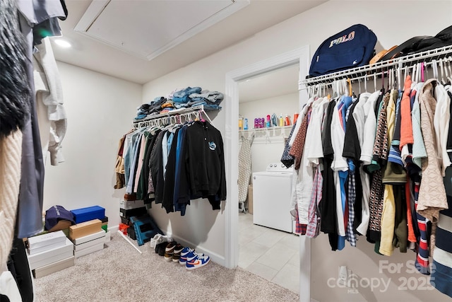 11518 Solstice Way, Huntersville, NC 28078 - spacious closet featuring attic access, washer / dryer, tile patterned flooring, and carpet