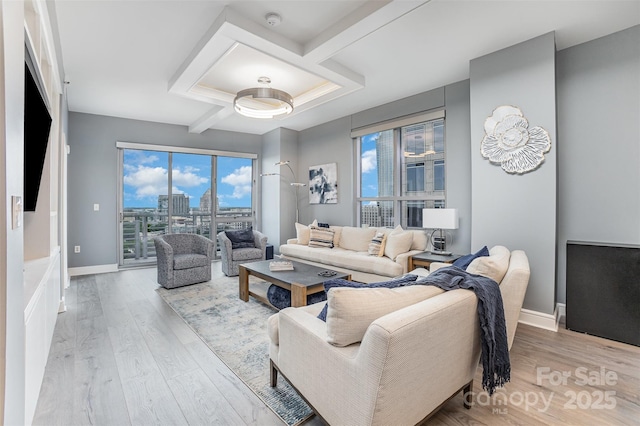 333 W Trade St Unit 1500, Charlotte, NC 28202 - living room featuring wood finished floors, baseboards, and a view of city