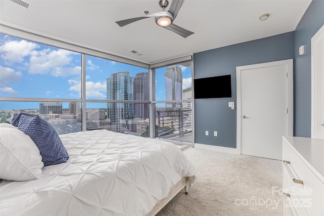 333 W Trade St Unit 1500, Charlotte, NC 28202 - bedroom featuring carpet floors, ceiling fan, and baseboards