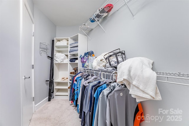 333 W Trade St Unit 1500, Charlotte, NC 28202 - walk in closet featuring carpet