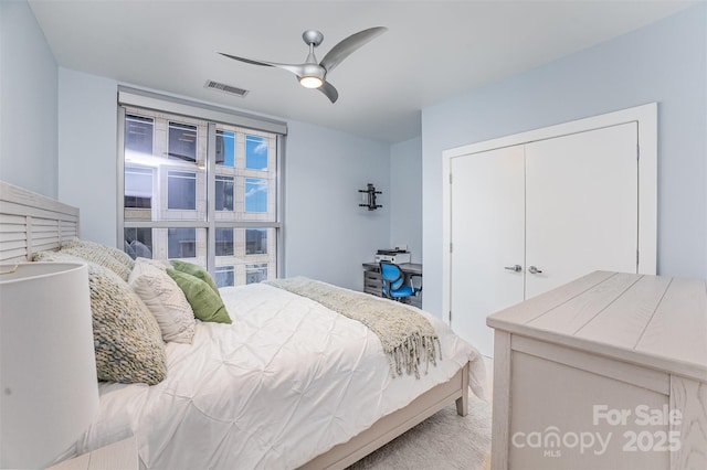 333 W Trade St Unit 1500, Charlotte, NC 28202 - carpeted bedroom with a closet and a ceiling fan