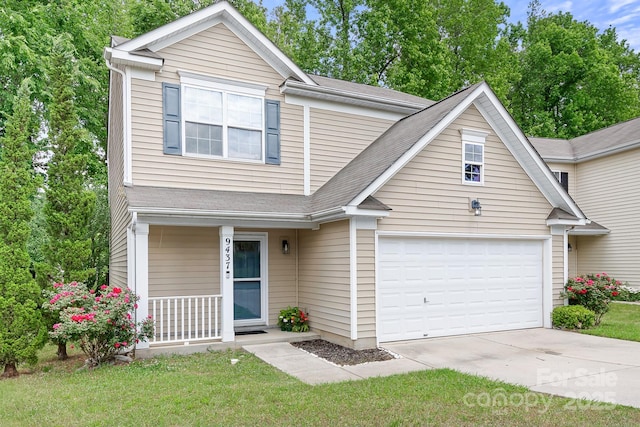 9437 Macquarie Ln, Charlotte, NC 28227 - traditional-style home featuring a porch, driveway, and a front lawn