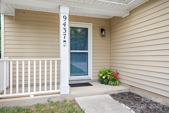 9437 Macquarie Ln, Charlotte, NC 28227 - entrance to property with a porch