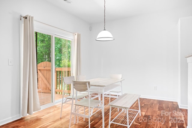 9437 Macquarie Ln, Charlotte, NC 28227 - dining area with wood finished floors and baseboards