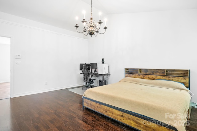 9437 Macquarie Ln, Charlotte, NC 28227 - bedroom featuring a chandelier, wood finished floors, lofted ceiling, and baseboards