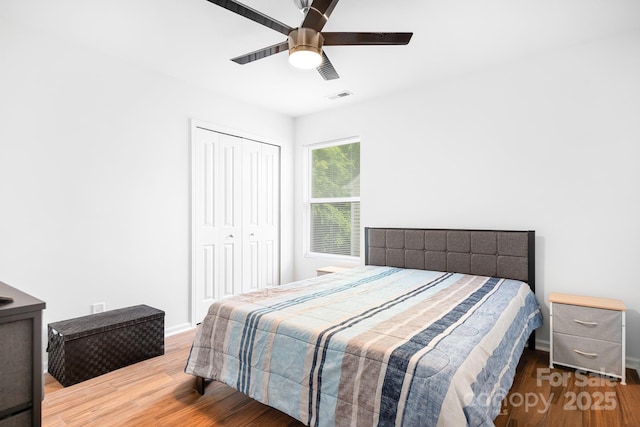 9437 Macquarie Ln, Charlotte, NC 28227 - bedroom featuring wood finished floors, baseboards, a closet, and ceiling fan