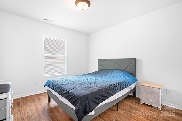 9437 Macquarie Ln, Charlotte, NC 28227 - bedroom with wood finished floors and baseboards