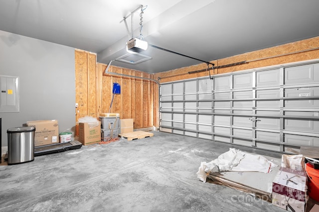 9437 Macquarie Ln, Charlotte, NC 28227 - garage with electric panel and a garage door opener