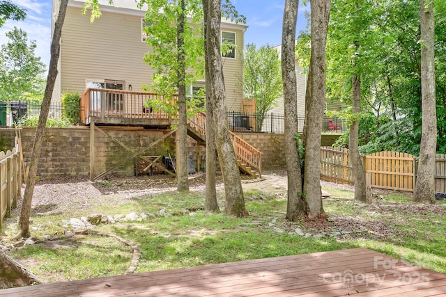 9437 Macquarie Ln, Charlotte, NC 28227 - rear view of house with a wooden deck, fence, and stairs