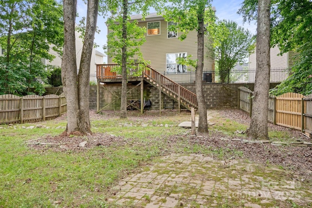 9437 Macquarie Ln, Charlotte, NC 28227 - rear view of house featuring fence, stairway, and a deck