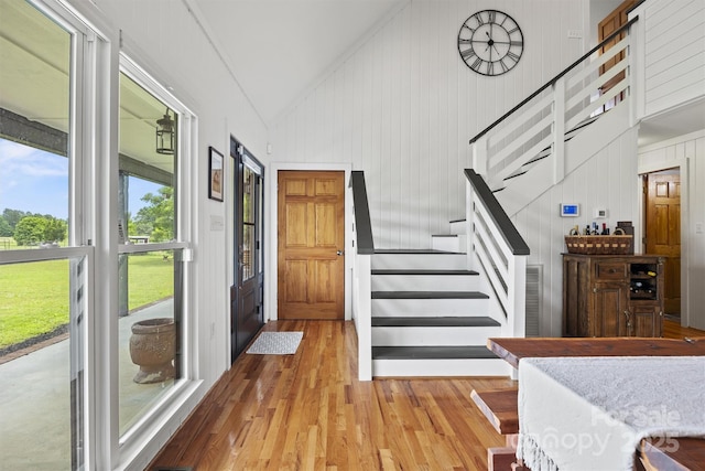 930 Hawley Rd, Mcconnells, SC 29726 - entrance foyer featuring wood finished floors, stairs, and high vaulted ceiling