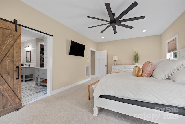 930 Hawley Rd, Mcconnells, SC 29726 - bedroom with a barn door, carpet, baseboards, recessed lighting, and ensuite bathroom
