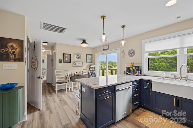 930 Hawley Rd, Mcconnells, SC 29726 - kitchen featuring stainless steel dishwasher, a peninsula, light wood-style floors, blue cabinets, and light stone countertops
