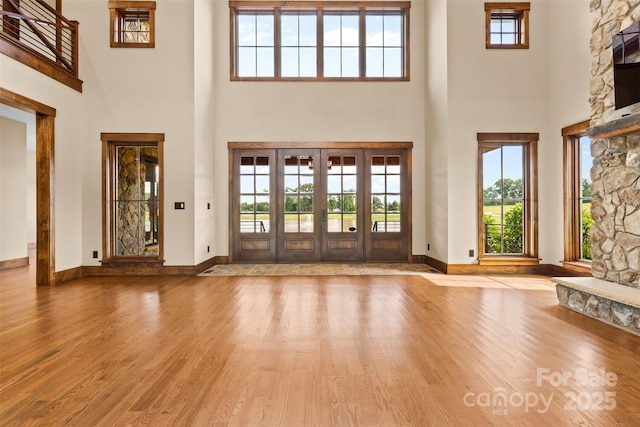 1822 Irby Rd, Monroe, NC 28112 - entryway featuring a high ceiling, wood finished floors, french doors, and baseboards