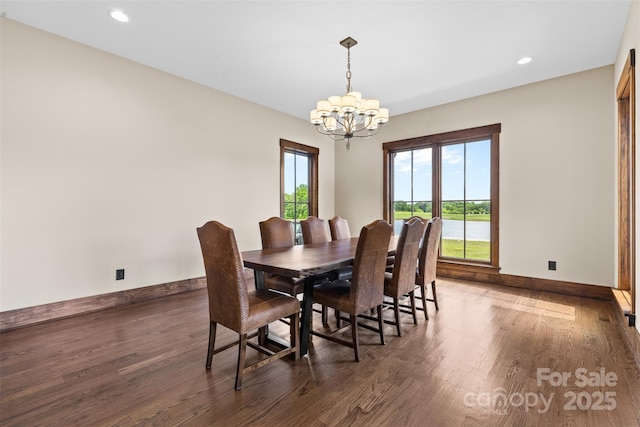 1822 Irby Rd, Monroe, NC 28112 - dining room featuring baseboards, a chandelier, wood finished floors, and recessed lighting