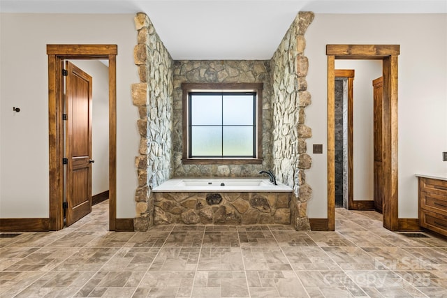 1822 Irby Rd, Monroe, NC 28112 - full bath featuring a bath, baseboards, and vanity