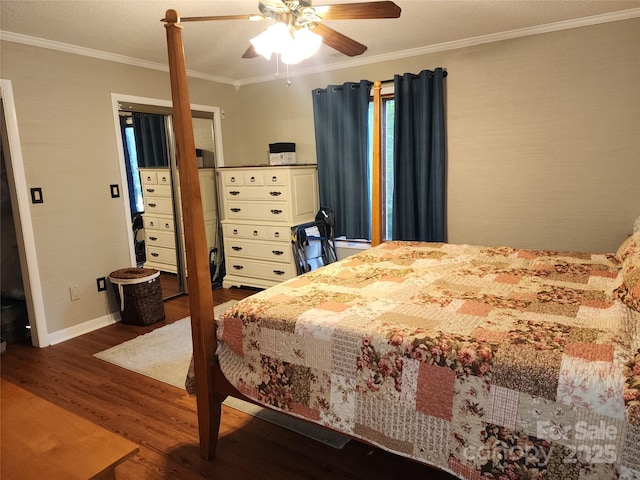 2800 Patio Ln, Gastonia, NC 28056 - bedroom featuring dark wood-style flooring, crown molding, baseboards, and a ceiling fan
