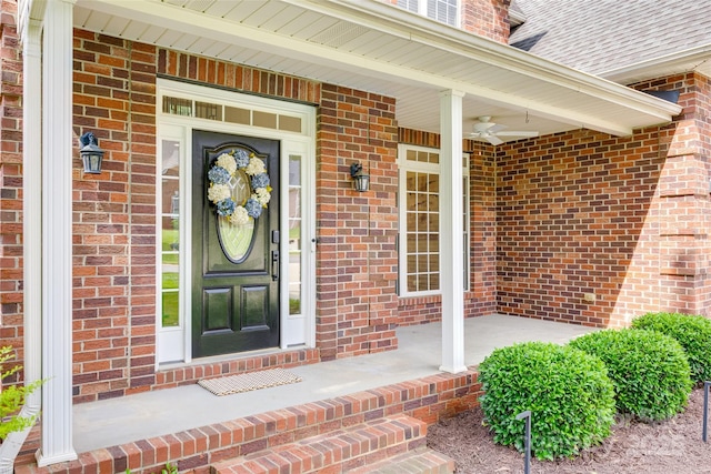 3741 Tea Olive Rd, Gastonia, NC 28056 - view of exterior entry with a porch, brick siding, and ceiling fan