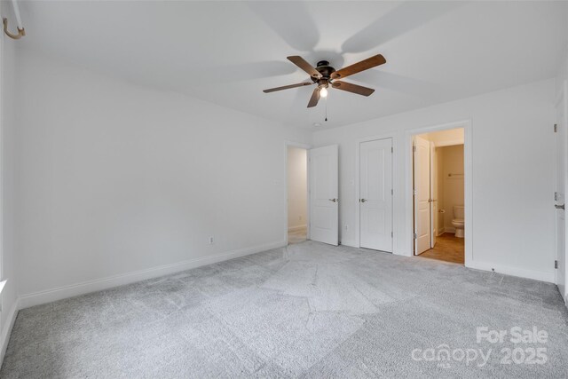 3741 Tea Olive Rd, Gastonia, NC 28056 - unfurnished bedroom with carpet flooring, baseboards, ensuite bathroom, and a ceiling fan