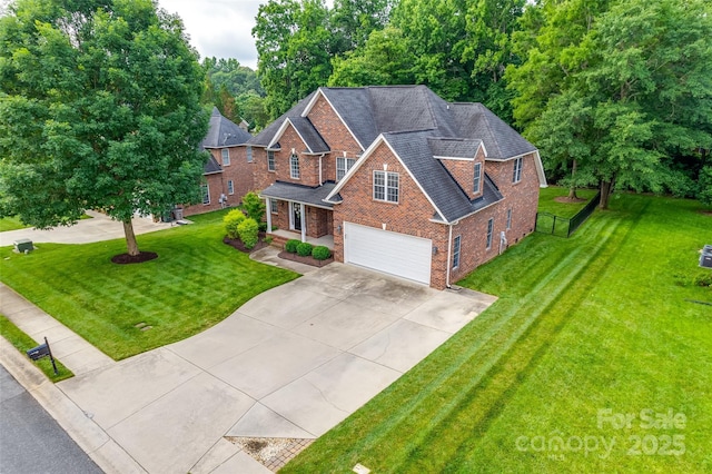 3741 Tea Olive Rd, Gastonia, NC 28056 - traditional-style house with brick siding, a garage, concrete driveway, and a front yard
