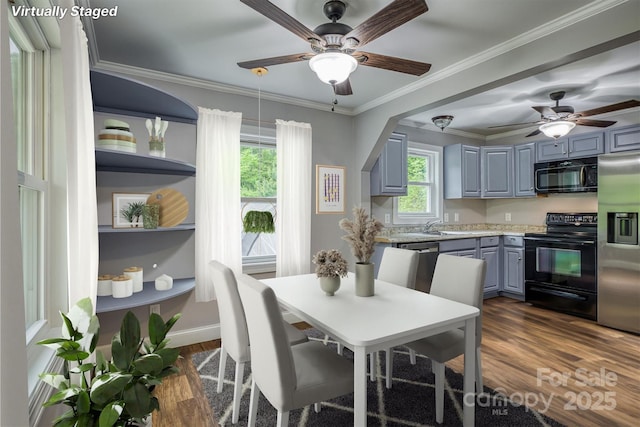 6470 Stone Mountain Rd, Lenoir, NC 28645 - dining room featuring ceiling fan, dark wood-style floors, baseboards, and ornamental molding