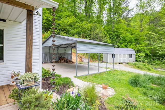6470 Stone Mountain Rd, Lenoir, NC 28645 - view of parking / parking lot with a detached carport and a storage unit